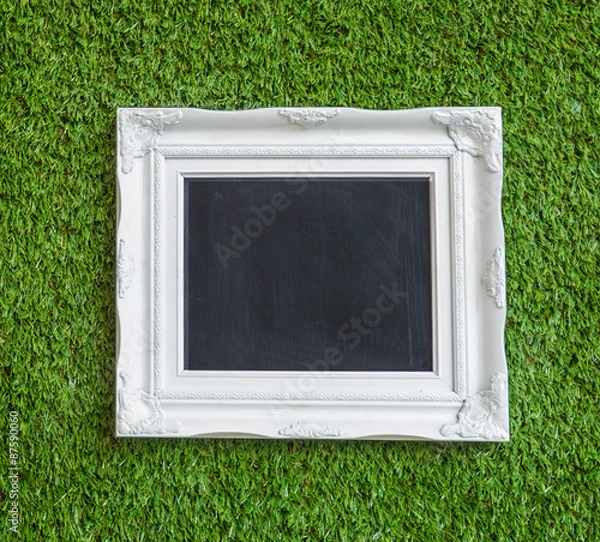 Obraz picture frame on green background