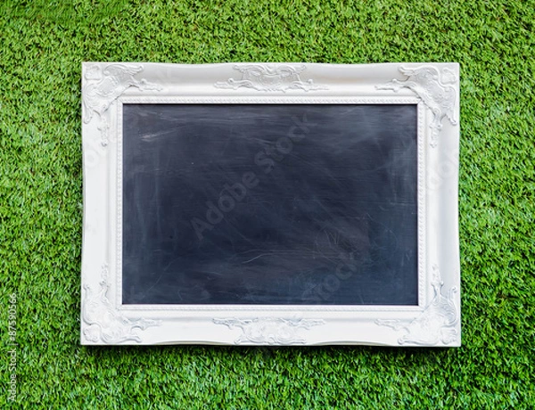 Obraz picture frame on green background