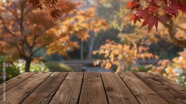 Fototapeta Autumnal Tabletop With Blurred Maple Leaves