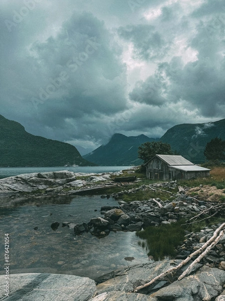 Fototapeta Gloomy Norway hut in front of fjords in July