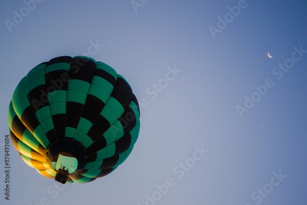 Obraz Green Checked Airborne Hot Air Balloon In Flight, Crescent Moon In Sky