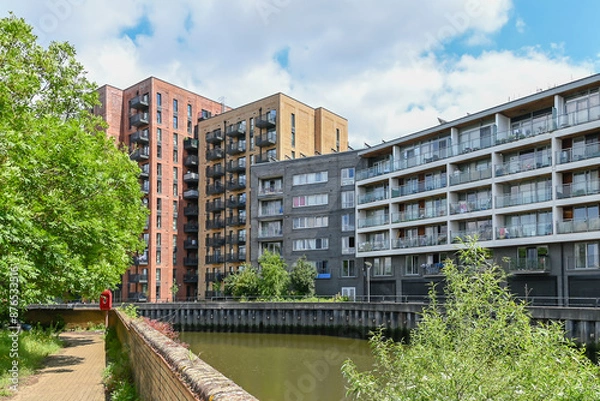 Obraz Modern accommodation in Barking along River Roding: London, UK, 24 May 2024 
