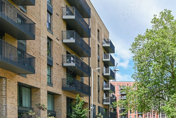 Obraz Modern accommodation in Barking along River Roding: London, UK, 24 May 2024
