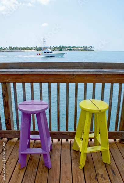 Obraz Colorful Painted Wooden Stools on Sunset Pier in Key West Florida USA