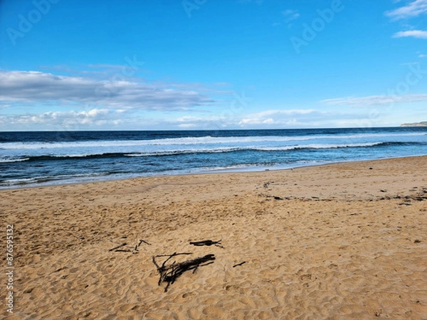 Fototapeta Deserted Bar Beach Newcastle New South Wales. On a Cold Winter's Day. Sandy Beach With Blue Sky Clouds and Surf