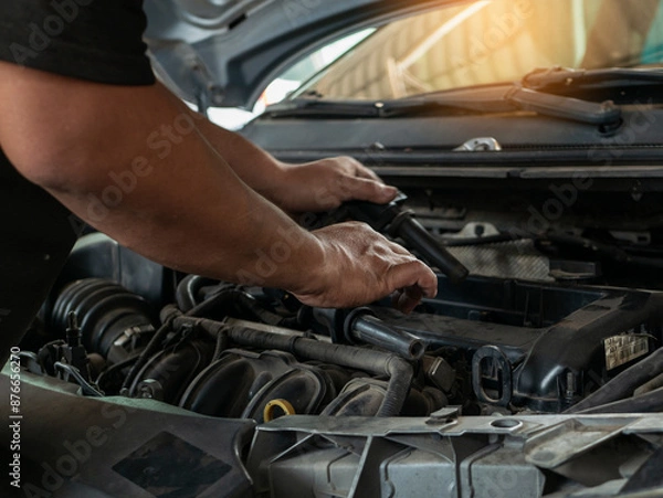 Fototapeta Mechanic car service auto garage in automotive mobile center. Technician workshop repair engine motor vehicles service mechanical engineering business. Automobile mechanic hands car repairs technic