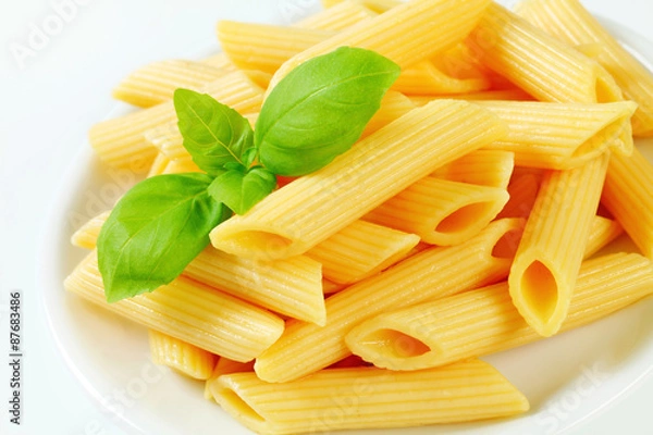 Fototapeta Cooked penne pasta