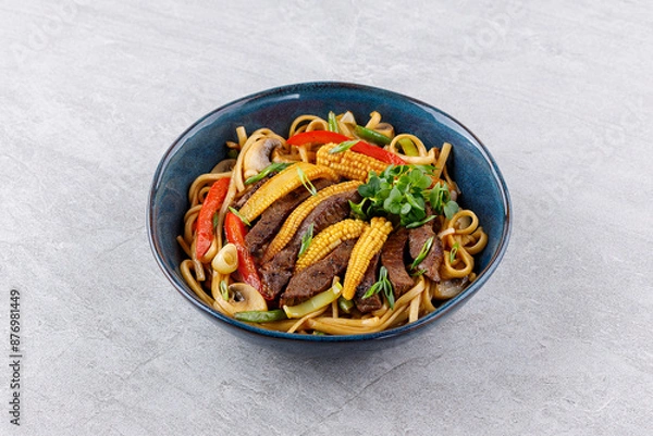 Obraz Udon noodles with beef and vegetables for the menu, website, restaurant or food delivery