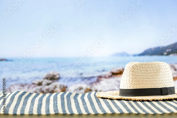 Obraz Beach accessories on summer beach mat on a tropical sandy beach. Seascape background. Copy space for montage products display.