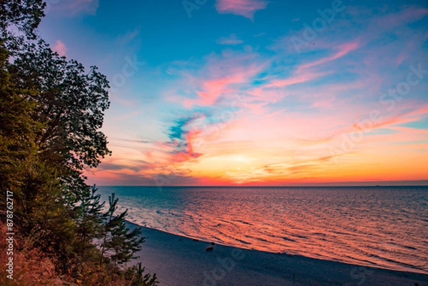 Obraz Zachód słońca i plaża widoczna z klifu w Jastrzębiej Górze.
