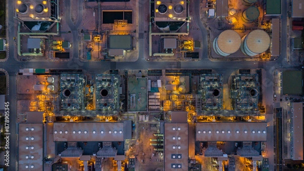 Fototapeta Aerial view power plant station thermal power plant at night, High voltage electrical power plant factory energy, Combine cycle station high voltage industry factory, Business power and energy.
