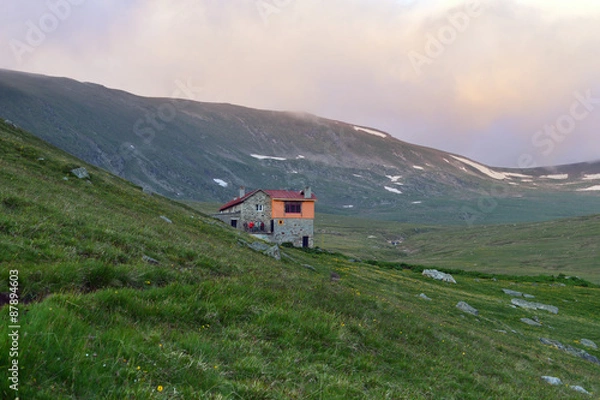 Obraz High Mountain hut in dusk