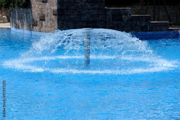 Obraz Swimming pool with fountain