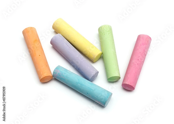 Fototapeta chalks in a variety of colors arranged on a white background