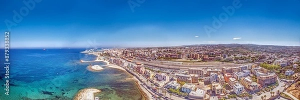 Fototapeta Drone panorama over the Italian city of Civitavecchia with harbor and cruise ships during the day