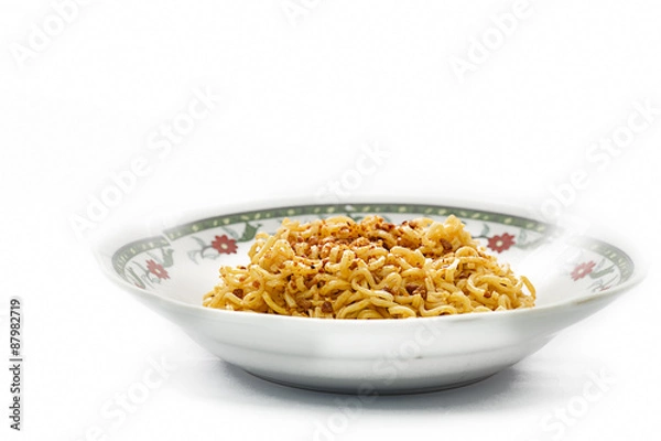 Obraz instant fried noodles in plate isolated on white background.