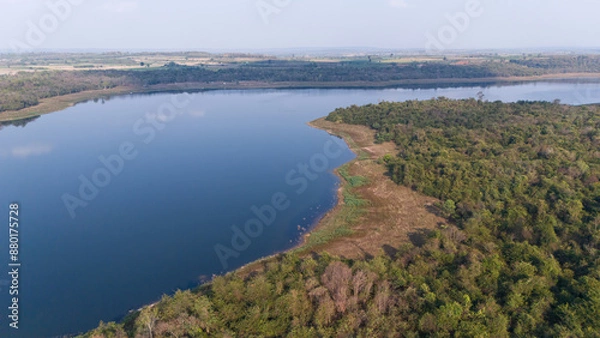 Fototapeta Aerial view of the reservoir dam and forest at a rural countryside