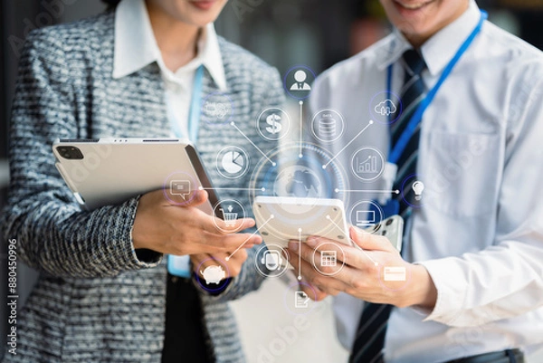 Fototapeta Asian business people working as a good team in the office. Successful teamwork in a meeting, workplace concept.