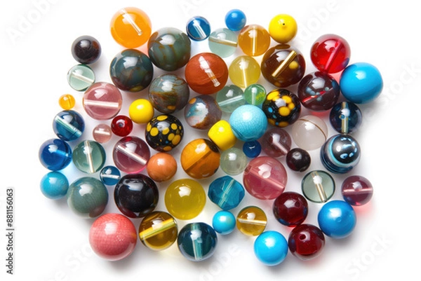 Obraz A bunch of colorful glass beads are scattered on a white background