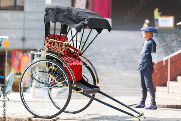 Fototapeta Japanese rickshaw man awaiting for the customers. Nagasaki