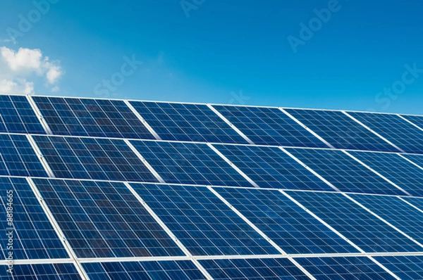 Obraz Solar panels on blue sky with copy space