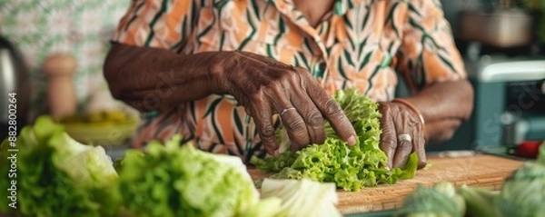 Obraz Black granny preparing salad