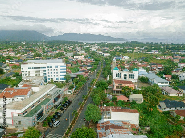 Fototapeta Aerial drone view of big city skyline scenery in Banda Aceh, Aceh, Indonesia.