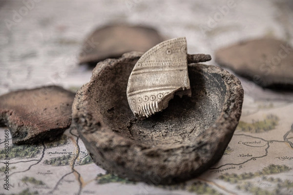 Fototapeta Part of a bone comb (comb) from the 1st-3rd century AD with patterns. Velbar culture