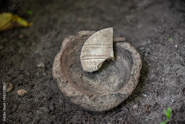 Fototapeta Part of a bone comb (comb) from the 1st-3rd century AD with patterns. Velbar culture