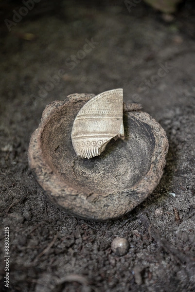 Fototapeta Part of a bone comb (comb) from the 1st-3rd century AD with patterns. Velbar culture