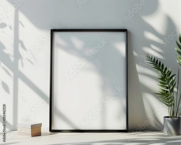 Fototapeta black blank frame sitting on a desk with small blank frame on a table, in the style of ambient occlusion