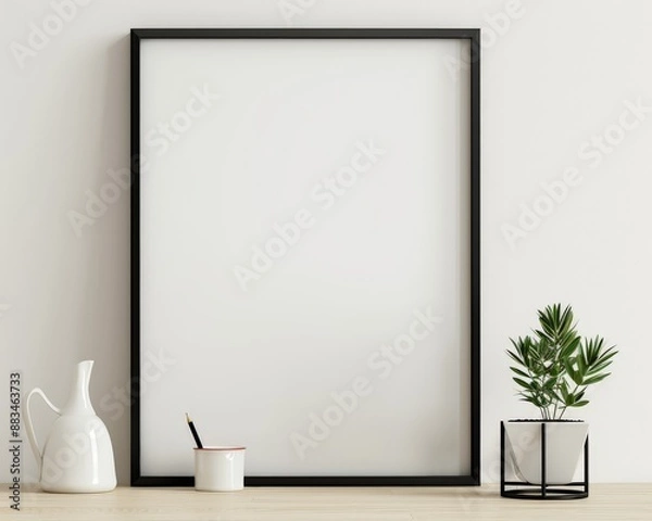 Fototapeta black blank frame sitting on a desk with small blank frame on a table, in the style of ambient occlusion