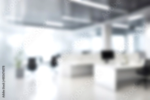 Fototapeta Blur open office with soft sunlight at big window for background usage. blur interior background concept. white and bright tone.