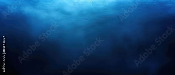 Obraz A deep blue underwater scene showing the calm yet mysterious depths of the ocean.