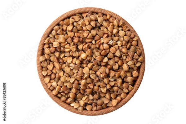 Obraz Green buckwheat grain in wooden bowl isolated on white background, top view. File contains clipping path.