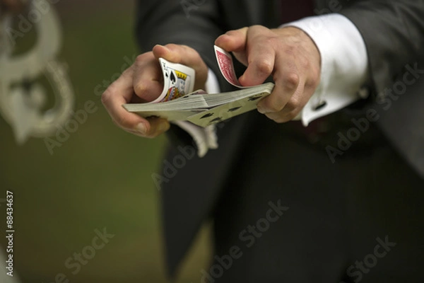 Obraz Magician shuffling cards