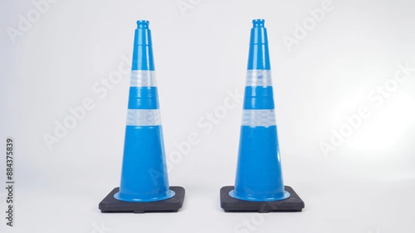 Fototapeta Two Traffic cone in blue color isolated white background