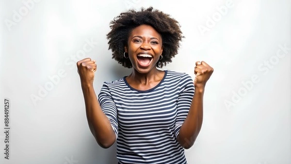 Obraz Excited black American lady eager for a yes stands over a white background. Joy of Victory American Lady Shaking Fists
