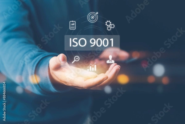 Fototapeta ISO standards quality control, assurance and warranty business technology concept. Businessman using laptop computer with quality assurance and document icon for ISO, ISO concept.