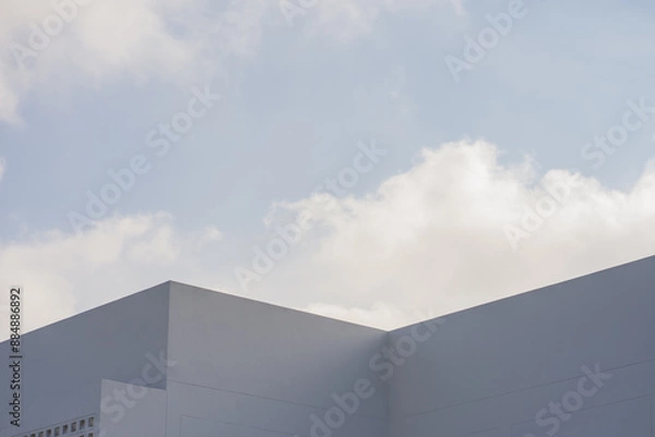 Fototapeta architecture and landscape concept with white building with clear sky background