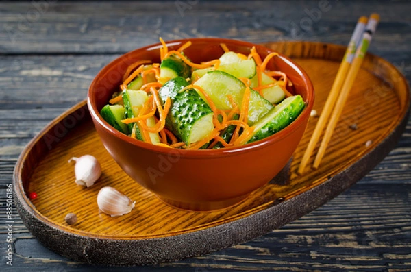 Fototapeta Cucumber salad with carrots