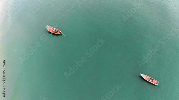 Fototapeta Top view of fishing boat in the sea.