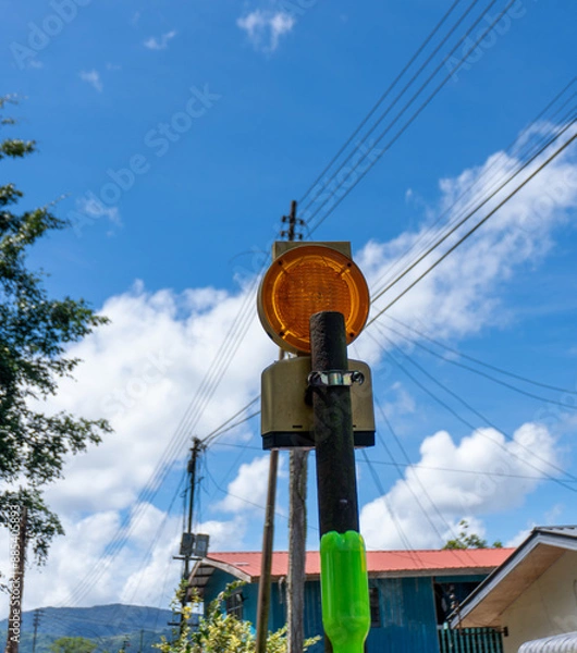 Obraz red flashing light at daytime