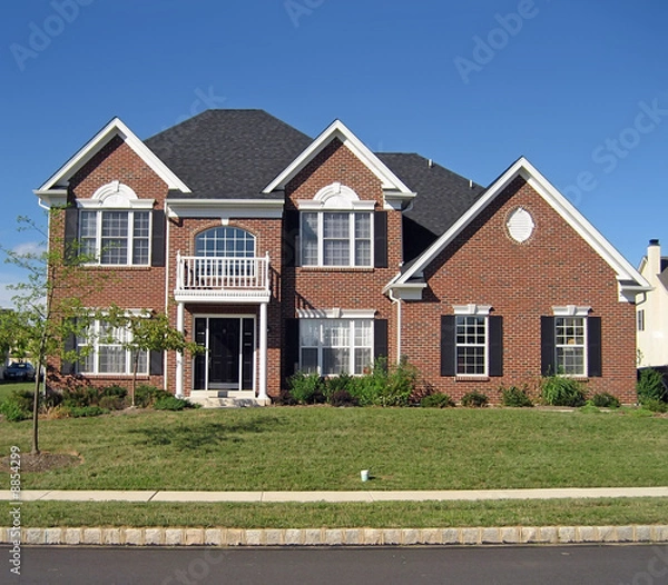 Fototapeta Facade of an upscale new home in the suburbs
