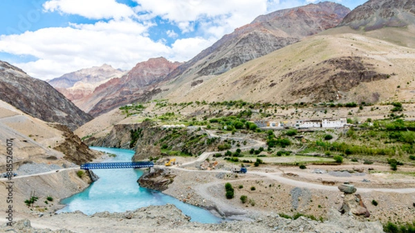 Fototapeta Aerial view of Purne Village, a serene and captivating destination nestled in the heart of the Zanskar Valley in Ladakh, India