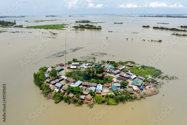 Obraz Aerial view showcasing the devastating impact of floods on villages in Northern Bangladesh, highlighting the submerged homes, affected communities, highlighting the severe impact and the resilience