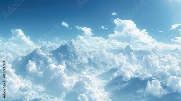Fototapeta Mountain range under a clear blue sky with soft, white clouds drifting by