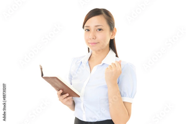 Fototapeta ガッツポーズのビジネスウーマン