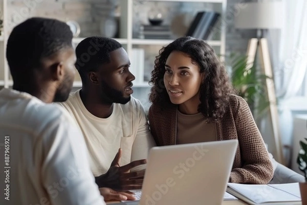 Fototapeta homebuying couple discussing mortgage options with a real estate agent, minimalist office settings and soft, natural lighting, decision-making process involved in purchasing a home through a mortgage