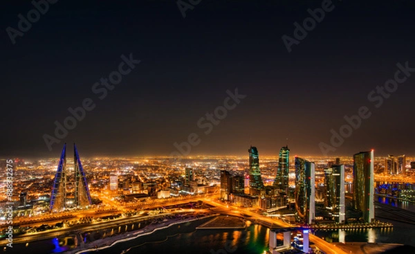 Obraz Enchanting night cityscapes of Manama, Bahrain, with its illuminated skyline, modern architecture, and vibrant nightlife. Perfect for travel enthusiasts seeking a glimpse of this Middle Eastern gem